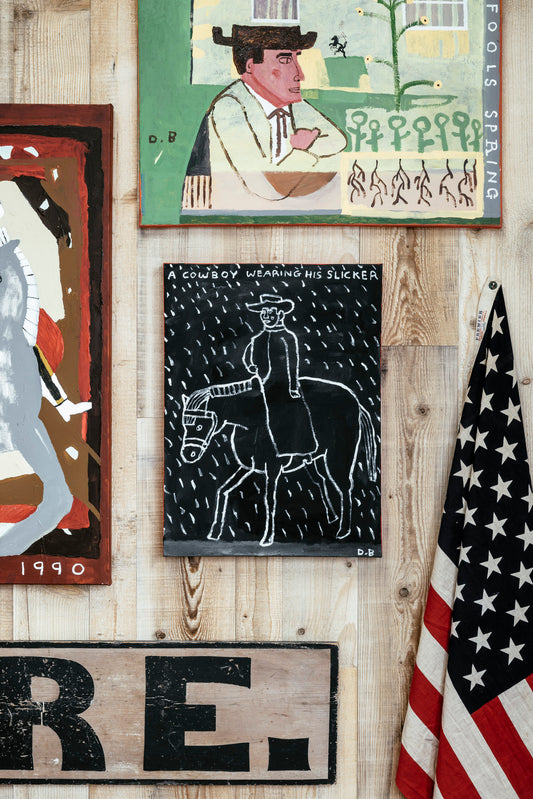 "A Cowboy Wearing His Slicker" Painting