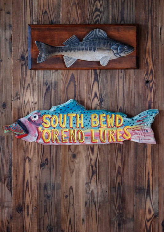 A Collection of Carved Wooden Fish