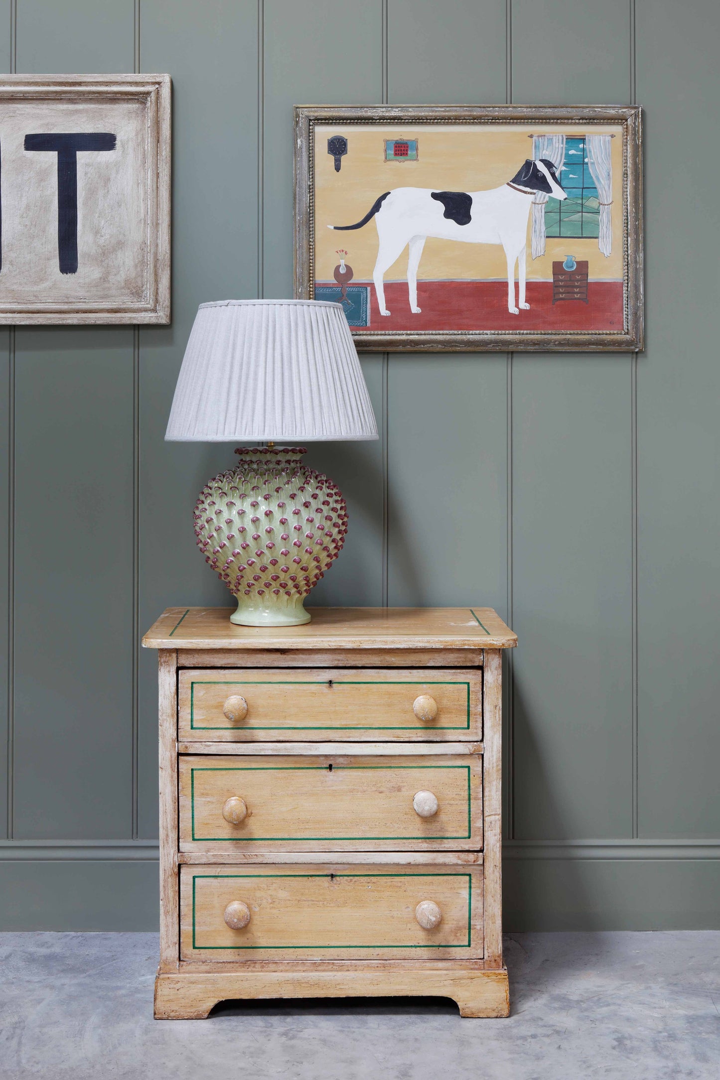 Pine Chest of Drawers with Green decoration.